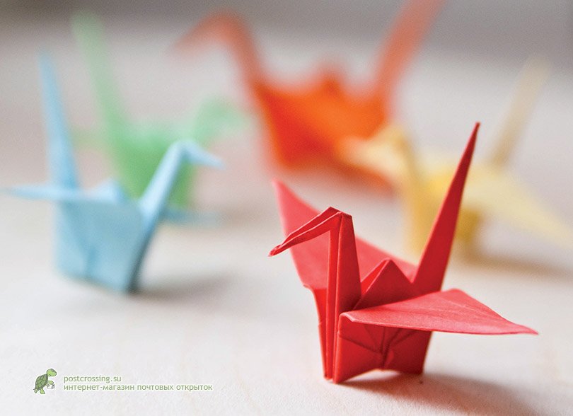Бумажный журавлик благотворительный. Оригами Журавлик. Журавлик счастья оригами. Японский Журавлик оригами. Бумажный Журавлик оригами символ.